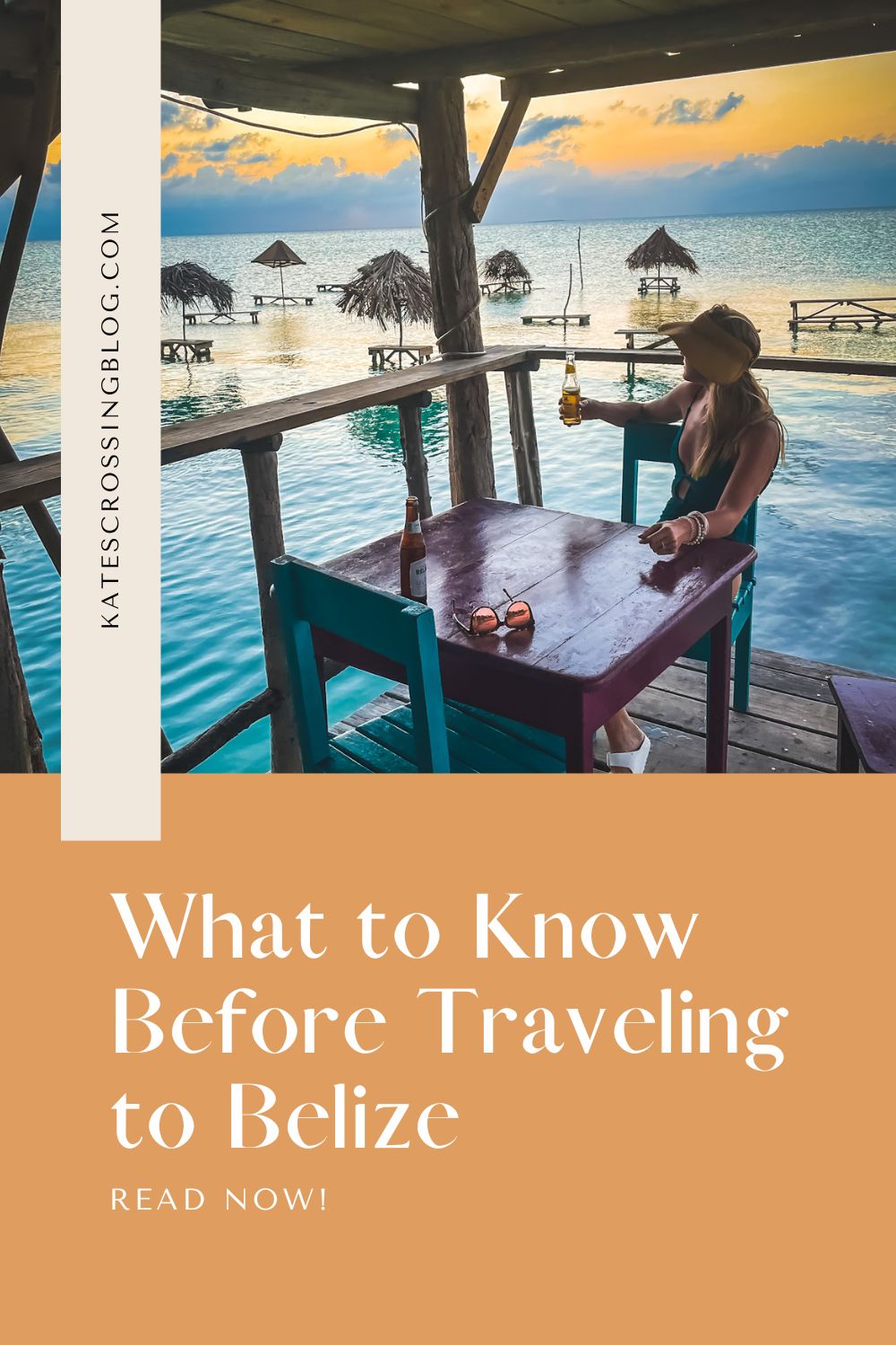 Woman sitting at a seaside restaurant in Belize, holding a beer and watching the sunset. The scene features thatched roof huts over the water. Text on image: 'What to Know Before Traveling to Belize' for a Belize Travel Tips Blog post.