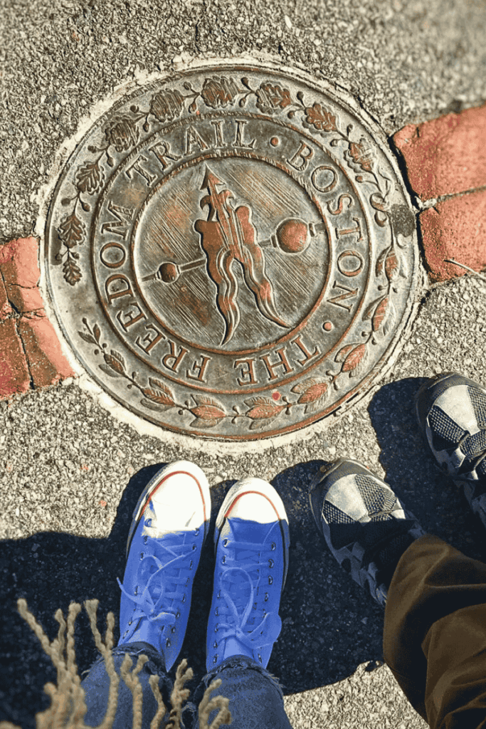 Kate and her husband standing beside the iconic Freedom Trail medallion in Boston, with their sneakers framing the historic plaque. A memorable step along their weekend getaway in Boston.







Ask ChatGPT
