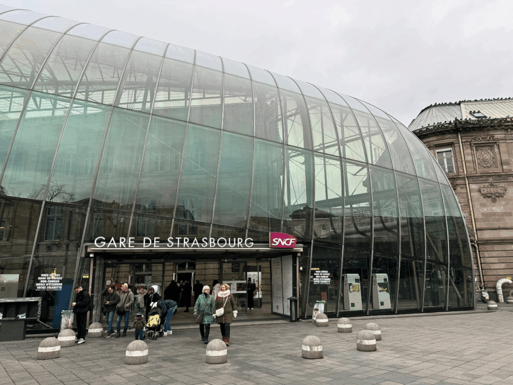 Outside view of the glass-domed entrance of Gare de Strasbourg, the city’s main train station.