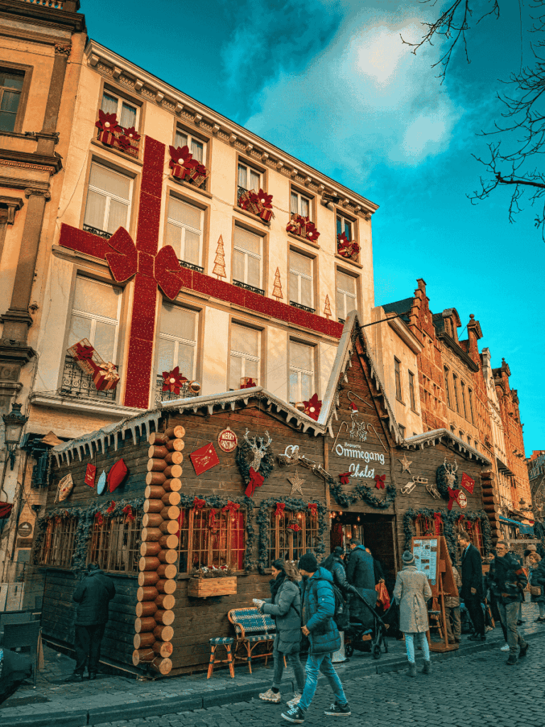 A festive restaurant decorated like a giant Christmas present draws in passersby.
