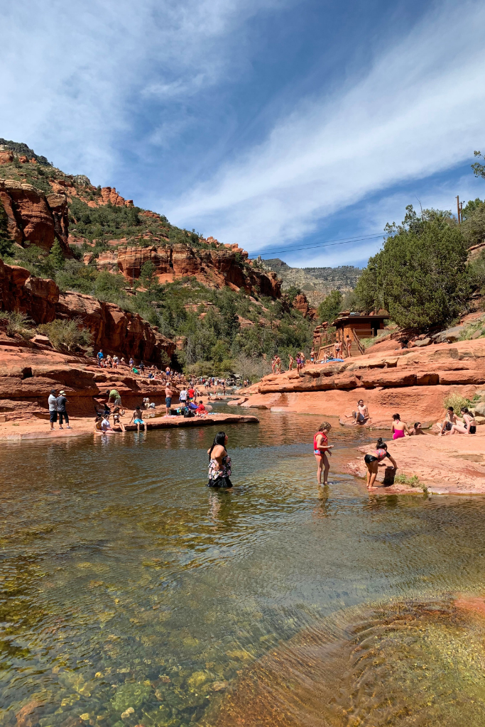 Swimmer swimming in the pools at Slide Rock State Park in Sedona.
