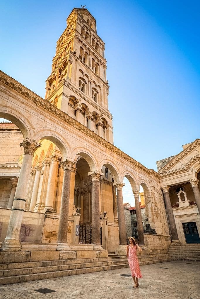 Kate walking beneath the ruins in Split Old Town in the early morning all by herself.