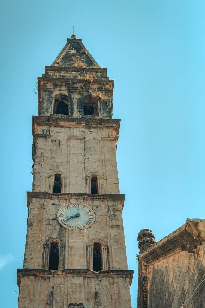 The historic bell tower in Perast rises above the village’s stone buildings, adding to the old-world charm of Montenegro’s stunning Bay of Kotor.