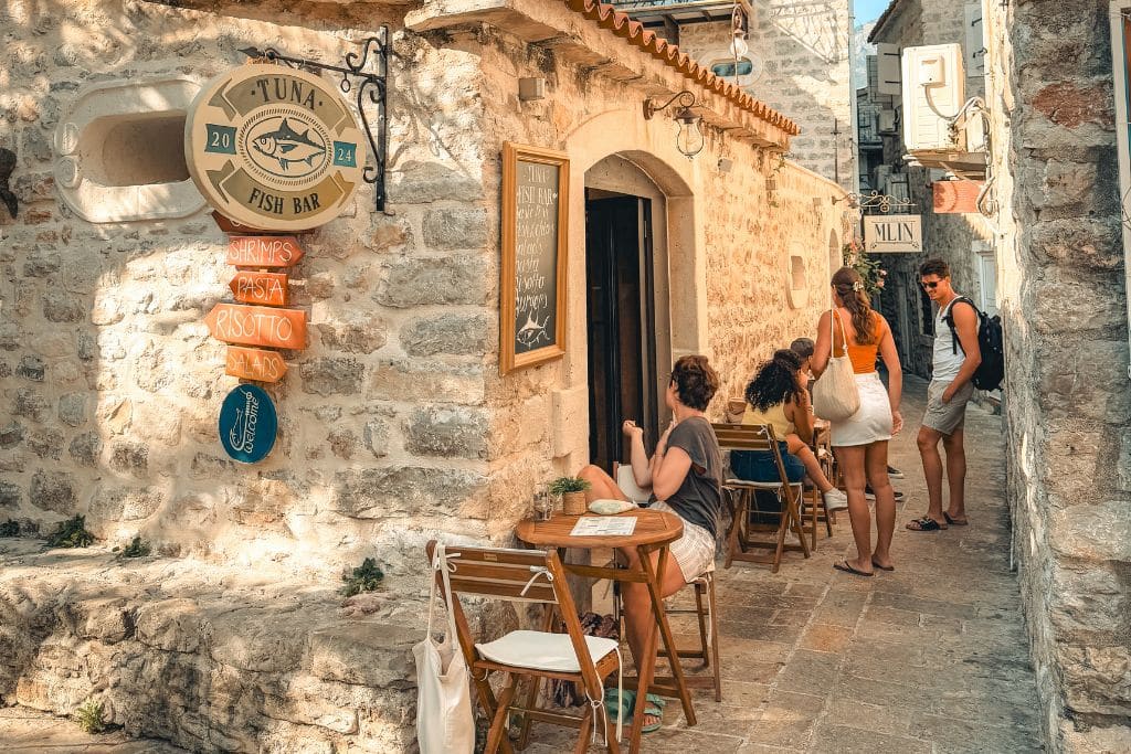 A cozy little seafood restaurant tucked into the stone alleyways of Budva’s Old Town captures the relaxed and charming atmosphere of Montenegro’s Adriatic coast.