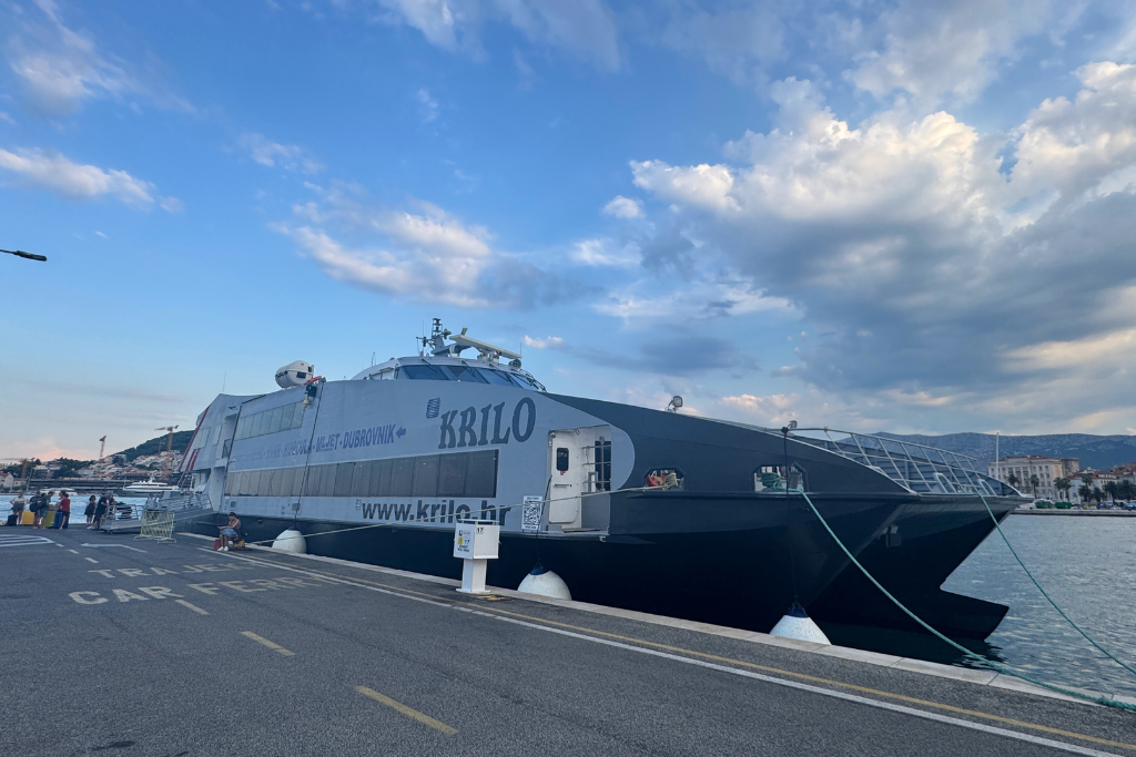Large ferry boat docked at a pier in Split, Croatia.