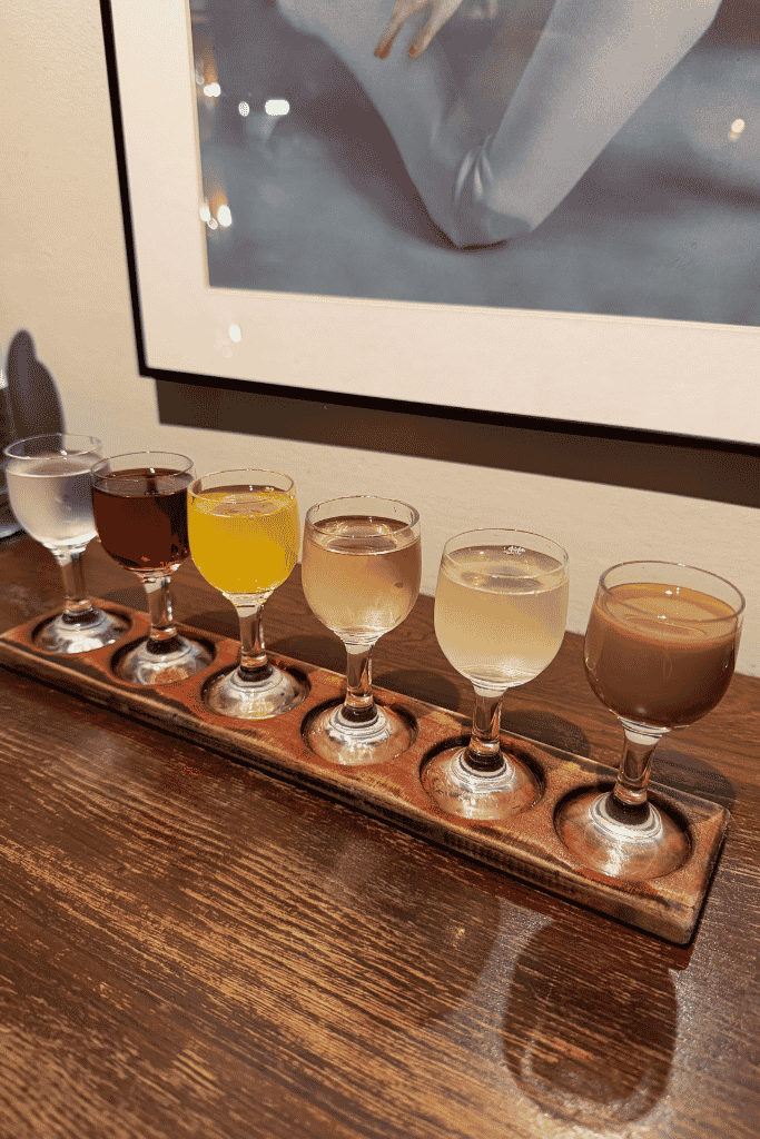 A tasting flight of colorful flavored vodkas served at a vodka bar in Krakow, Poland.