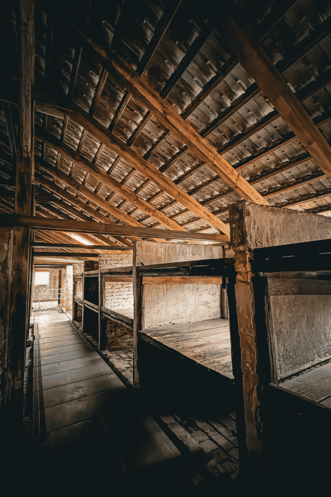 Wooden bunks inside one of the preserved barracks at the Auschwitz concentration camp in Poland.