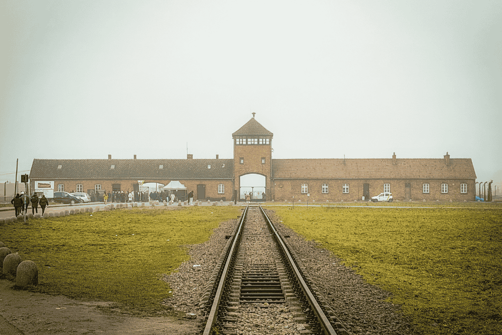 Railroad tracks leading to the entrance of Auschwitz-Birkenau concentration camp in Poland.