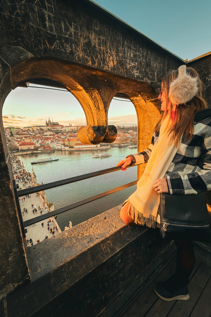 Golden-hour views over the Vltava River and Prague’s red rooftops, with Prague Castle rising in the distance—one of the city’s most unforgettable panoramas.