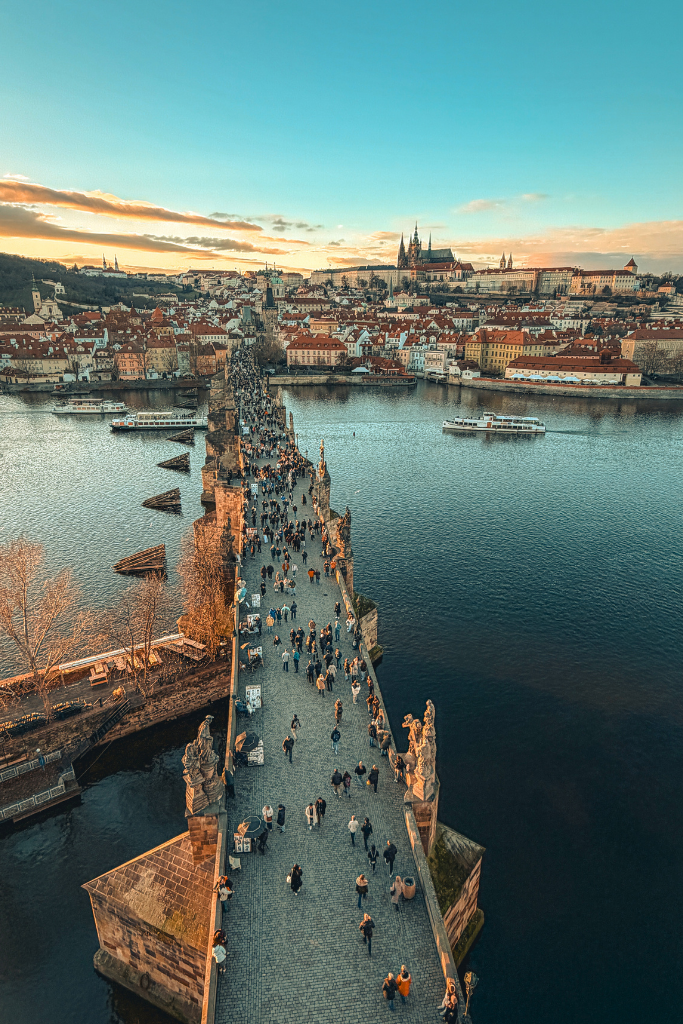 A breathtaking sunset view over Charles Bridge, the Vltava River, and Prague Castle—one of the most iconic panoramas in Prague.