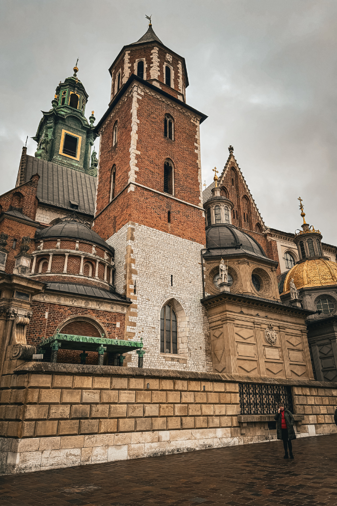 Historic towers and ornate architecture of Wawel Royal Castle in Krakow, Poland.