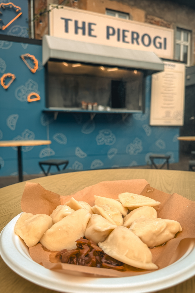 Plate of traditional Polish pierogi from The Pierogi food stall at Judah Food Market in Krakow.