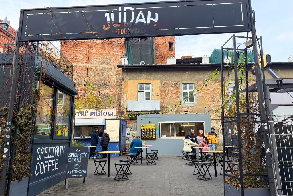 Judah Food Market in Krakow’s Kazimierz district with food trucks and outdoor seating.