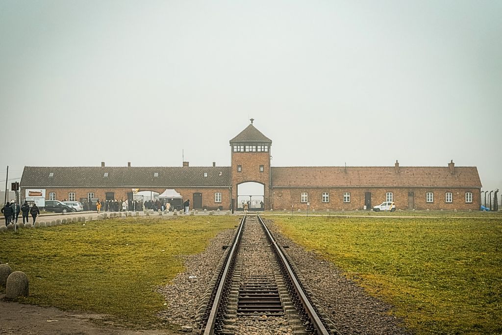 Railroad tracks leading to the entrance of Auschwitz-Birkenau concentration camp near Krakow, Poland.