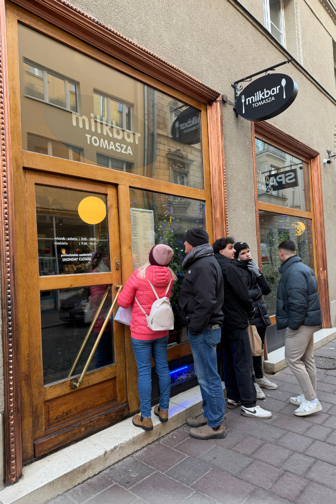 People waiting outside Milkbar Tomasza, a popular Polish milk bar in Krakow.
