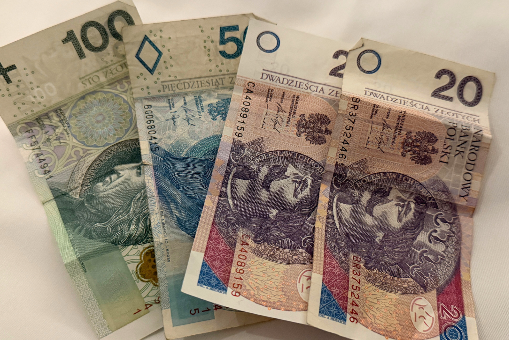 Polish złoty banknotes in 20, 50, and 100 złoty denominations, the currency used in Poland.