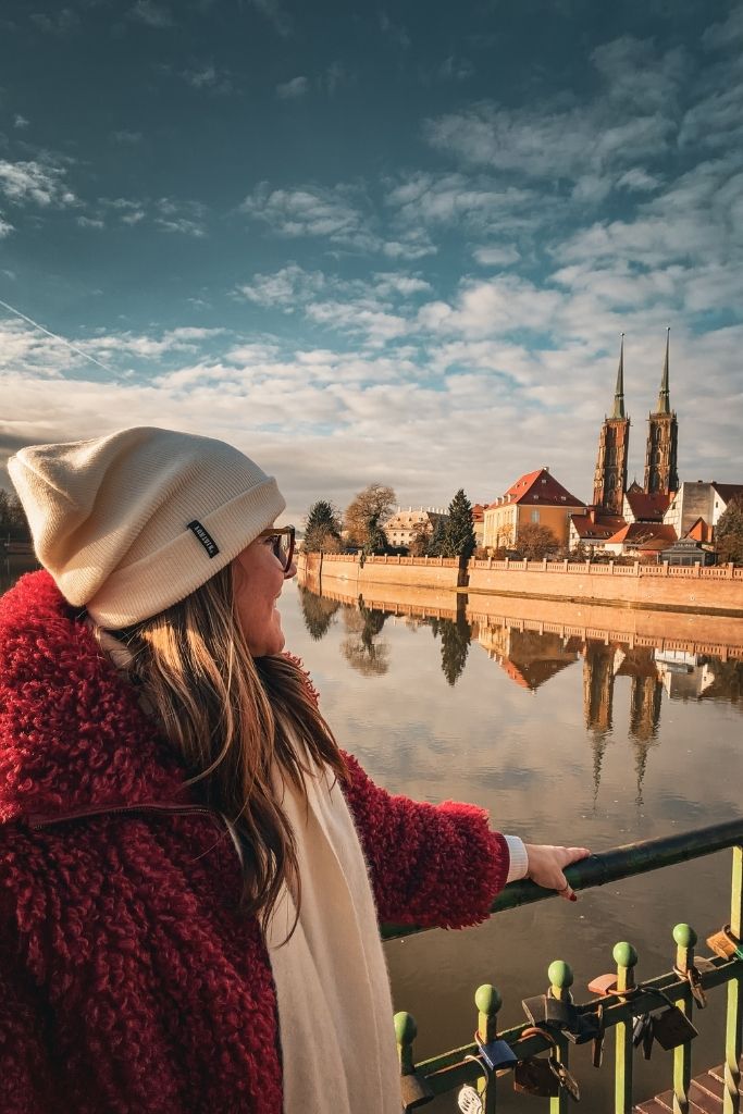 Kate overlooking the Oder River toward Wroclaw Cathedral and the historic buildings of Cathedral Island.